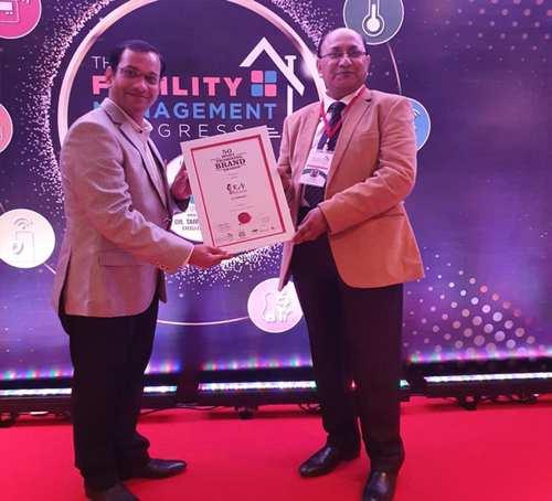 Nittile Gupta receiving the 50 Most Promising Brand award in Mumbai